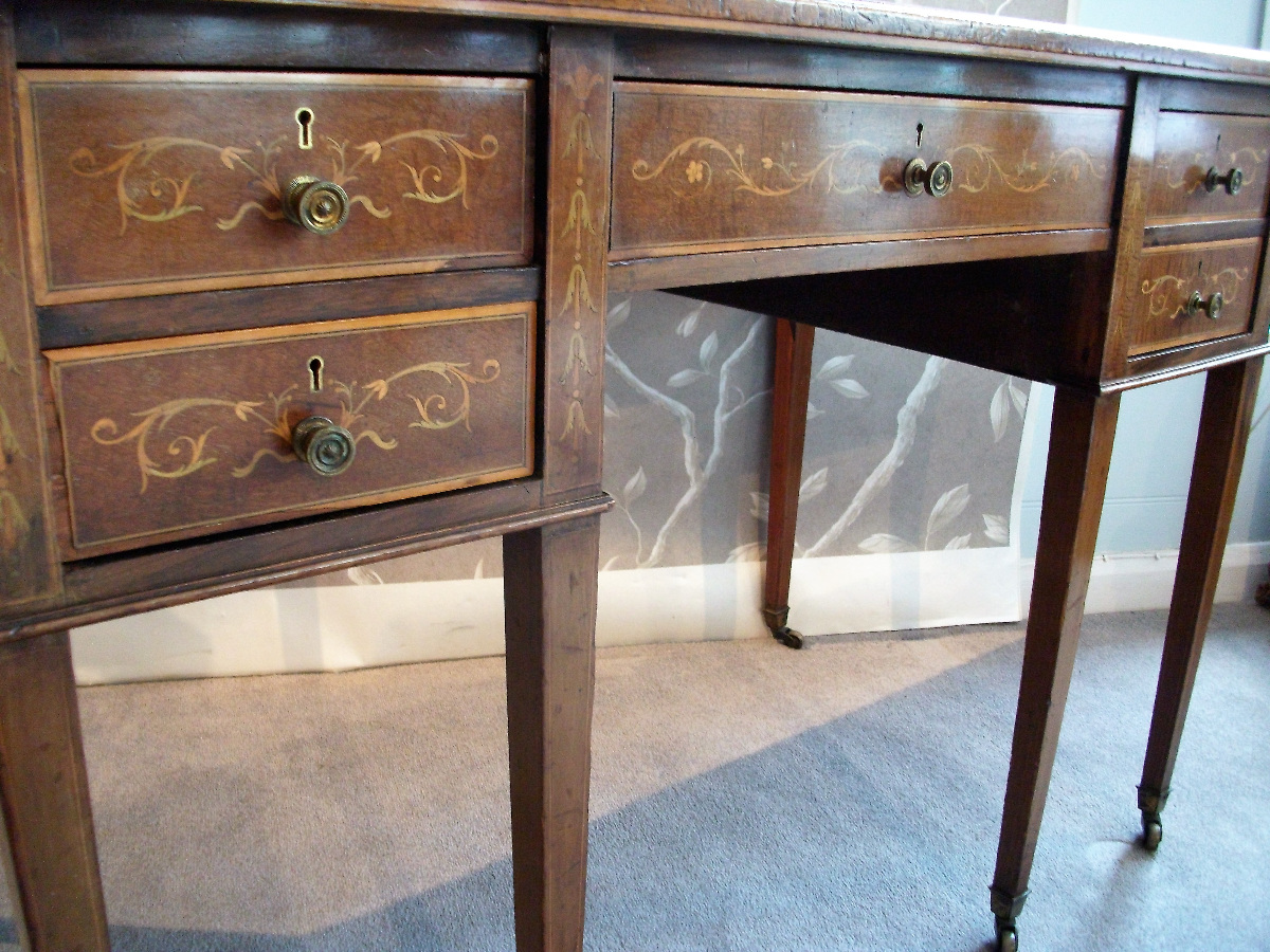  mahogany inlaid writing table with delicate ribbon and foliage inlay